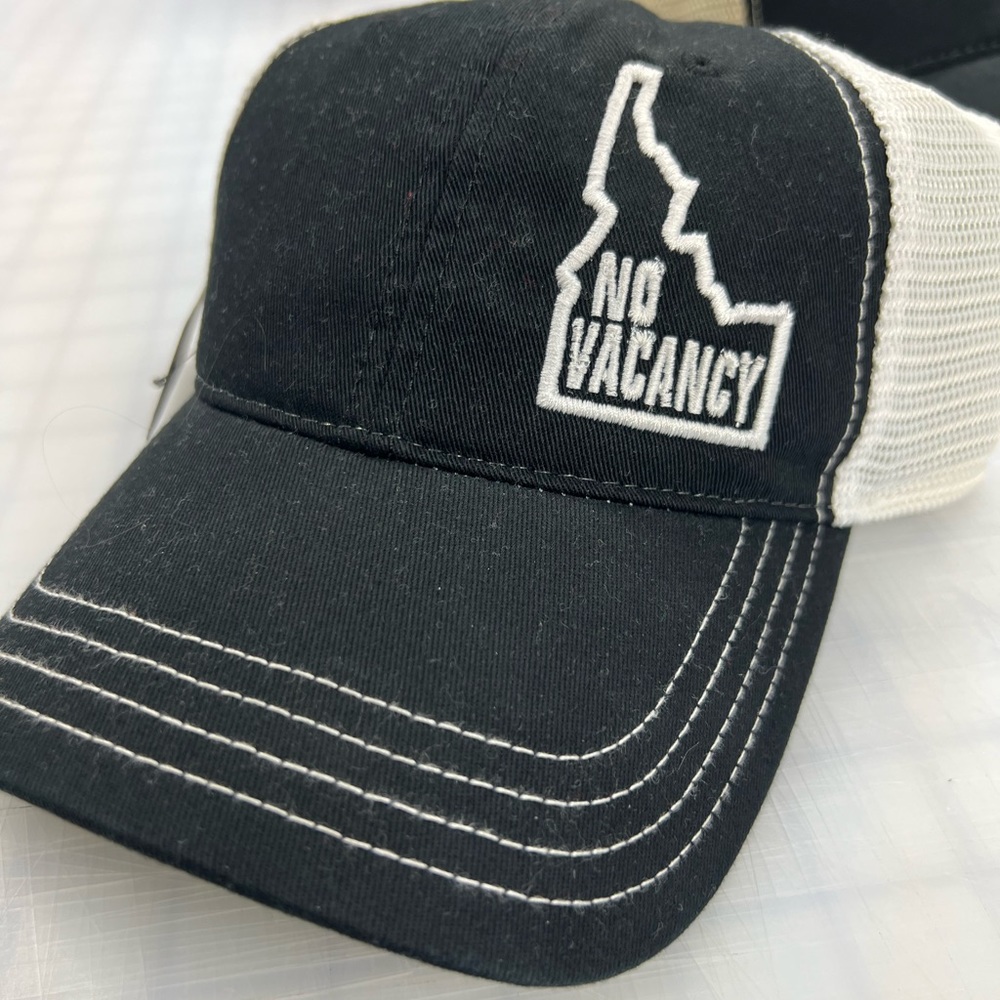 Richardson 111 unstructured mesh snap back with "No Vacancy- Idaho" embroidered.